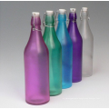 Colored frosted glass wine bottle.